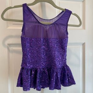 Purple sequined dance costume top.